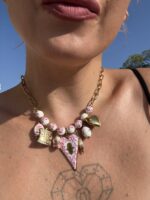 Belladonna Pink charm necklace with ceramic floral beads.