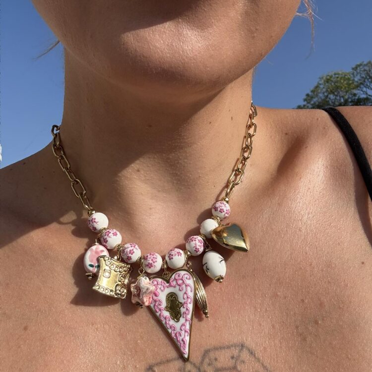 Belladonna Pink charm necklace with ceramic floral beads.