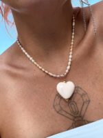 Aveline freshwater pearl necklace with white ceramic heart.