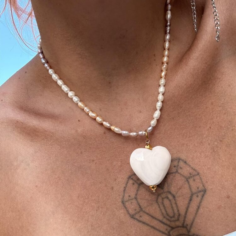 Aveline freshwater pearl necklace with white ceramic heart.