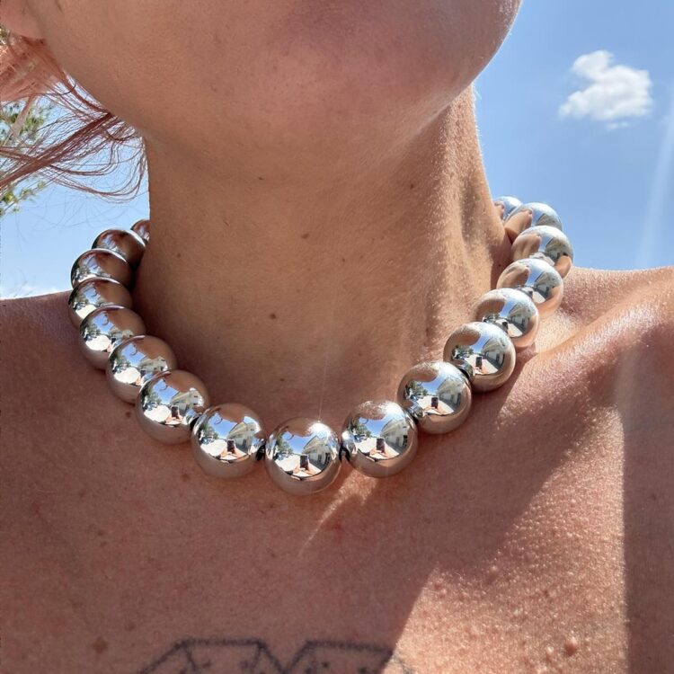 Titan Silver necklace with glossy silver acrylic beads.