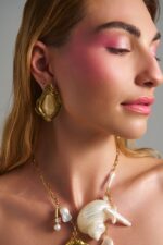 Sandy Stone stainless steel statement earrings with Cat Eye stone.