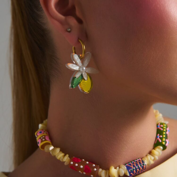 Handmade lemon and daisy hoop earrings.