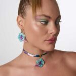 Mini Hawaii Blue tropical flower earrings.